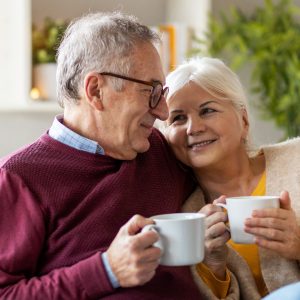 Portrait,Of,A,Happy,Elderly,Couple,Relaxing,Together,On,The