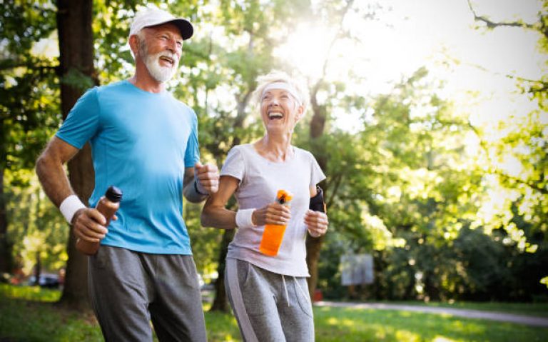 Active and sporty senior couple engaging in healthy sports activies
